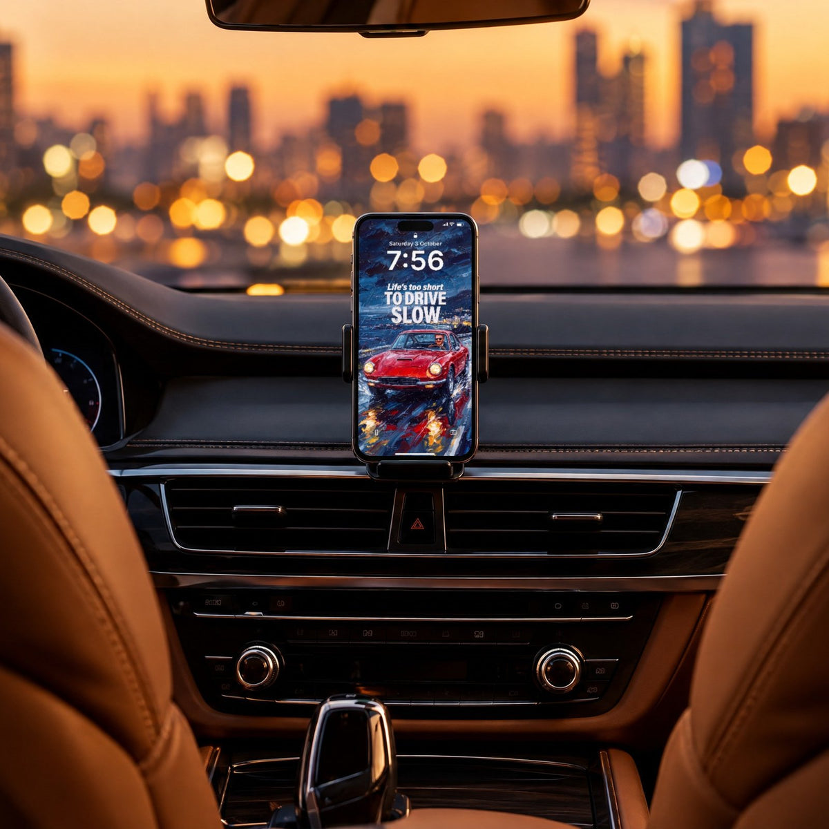 A phone in a car mount at dusk, lock screen with Life's too short to drive slow from AMBITION Vol. 1